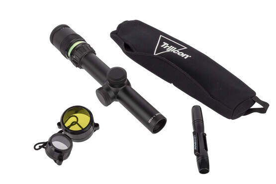 The Trijicon TR24 AccuPoint with 1-4x magnifcation and Green triangle post reticle includes a lens pen cleaning tool and see-through lens caps.